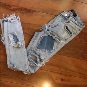 Distressed Light Blue Straight Leg Jeans